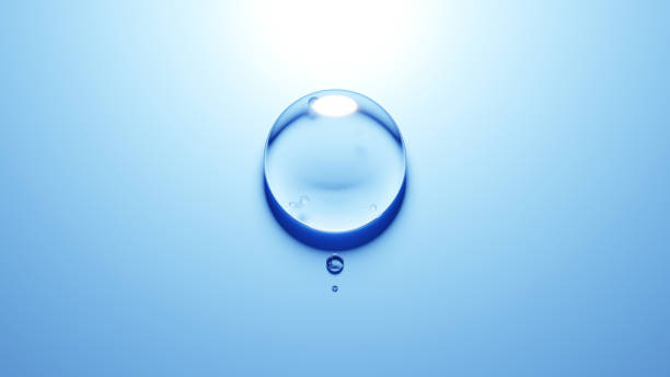 istock 3D Illustration.Three water droplets on blue background.(horizontal) 2153164827
