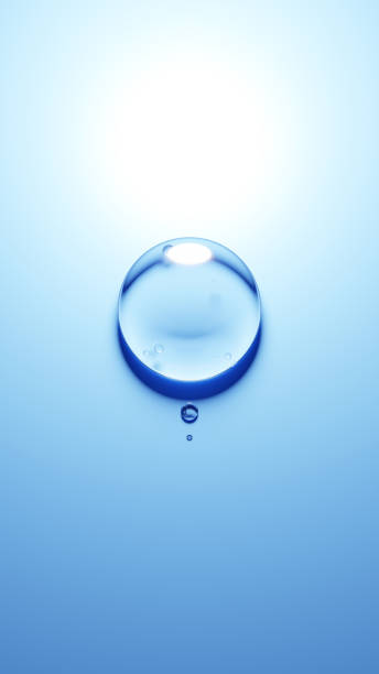 istock 3D Illustration.Three water droplets on blue background.(Vertical) 2153164829