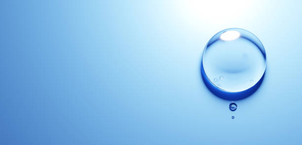 istock 3D Illustration.Three water droplets on blue background.Copy space.(horizontal) 2153164830