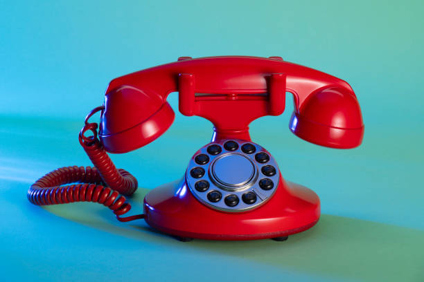 istock Retro red telephone on blue green background 2153167954