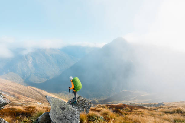 istock Woman hiker looking at a view after ascent. 2153169041