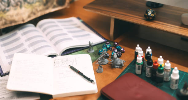 Miniatures and dice for adventure story on battle map role playing tabletop game and board games hobby