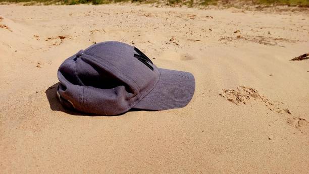 istock Cap on the sand on the beach 2153173537