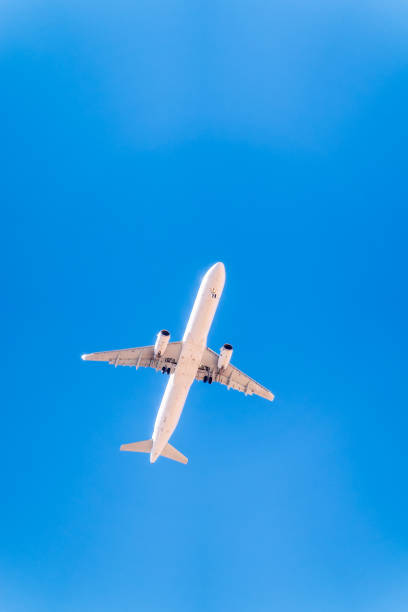 istock Airplane before landing in blue sky, Airbus A321-200 2153173646