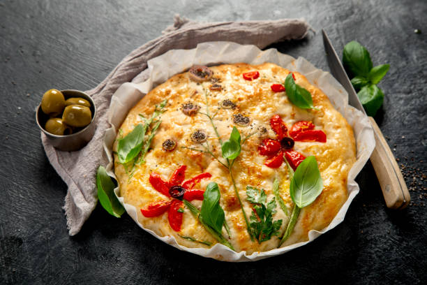 istock Focaccia art. Italian bread on dark background 2153173976