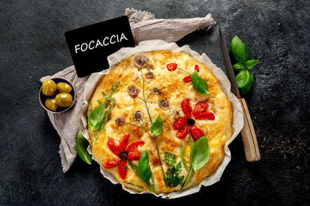 istock Focaccia art. Italian bread on dark background 2153174664