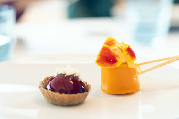 Small pieces of various tasty cake, there are placed on the international buffet meal. Sweet dessert food object photo, Close-up and selective focus.