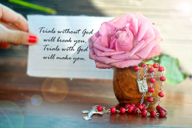 istock Lady holding notepaper with text message - Trials without God will break you. Trials with God will make you. 2153175942