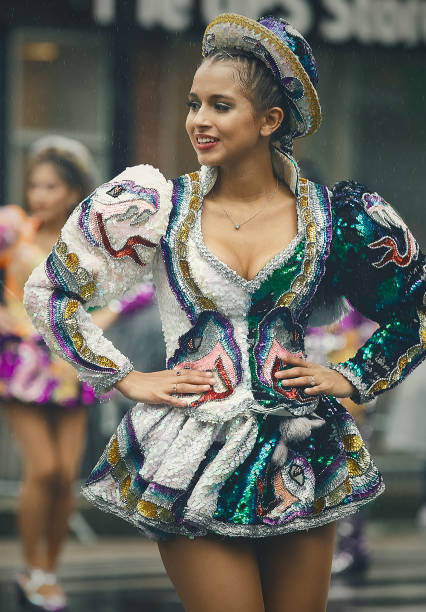 A dancer wearing a costume in the rain at the Dance Parade in New York, USA on May 21, 2023