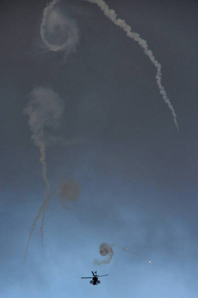 Aerial acrobatics stunt flying plane. Airplane with smoke in the sky for air show.