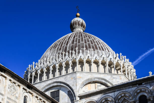 Piazza del Duomo complex with the famous leaning Pisa tower at the back, located at Pisa nearby Florence, Italy.