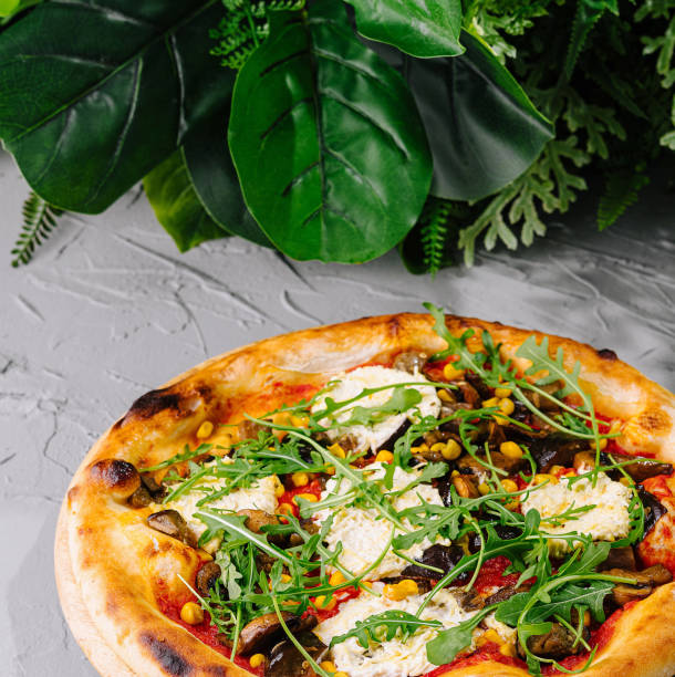 istock Fresh vegetarian pizza on gray background 2153184153