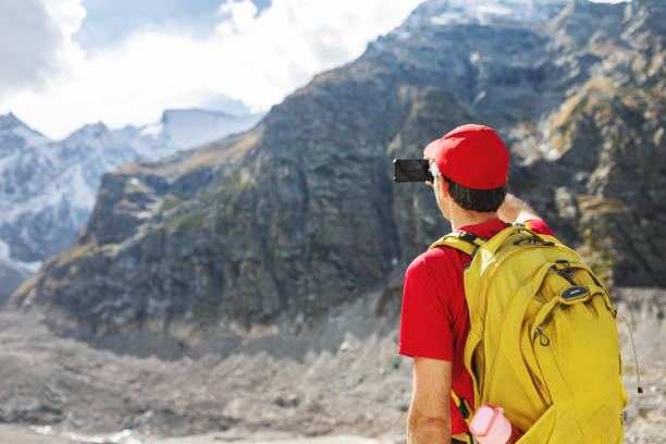 istock Mid adult man making selfie white hiking in mountains 2153185082