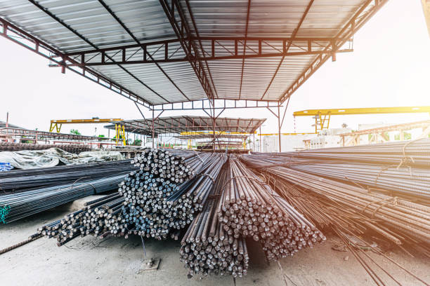 istock Round Bar Steel high strength for construction concrete casting industry, long line cylindrical metal bar stock. 2153190555