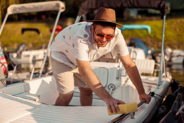istock Man getting his boat ready for a ride on the river 2153195899