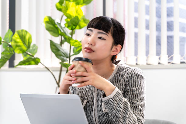 istock A female secretary taking a break with coffee 2153198353