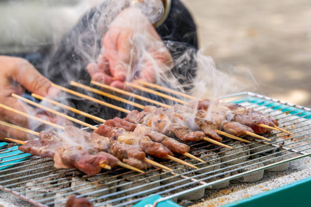 istock Outdoor portable disposable barbecue grill lamb kebabs 2153198848