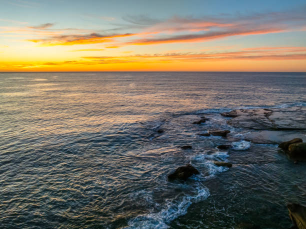 istock Sunrise at the seaside with high cloud 2153200169
