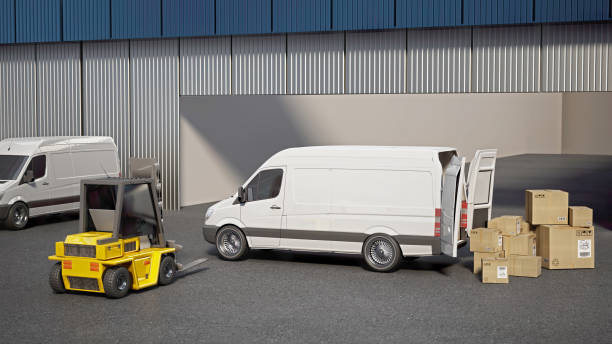 istock Busy Warehouse and or Loading Dock With Forklifts and Delivery Vans with cargo boxes 2153201155