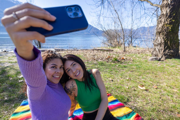 istock Outdoor Fun: Young Women Capture a Moment Together 2153204529