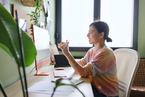 istock Woman having a video call with someone 2153210259