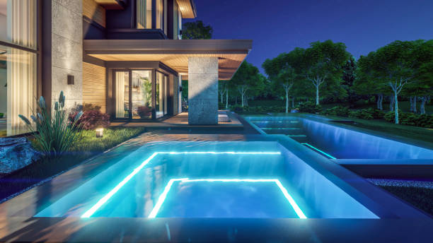 istock 3d rendering of modern house in luxurious style in night 2153214011