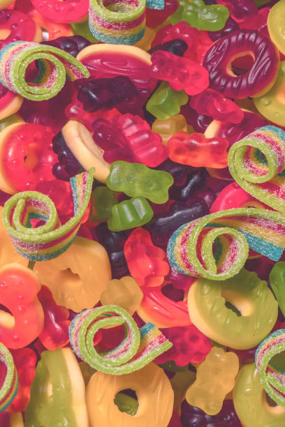 istock Assorted colorful gummy candies. Top view. Jelly donuts. 2153218655