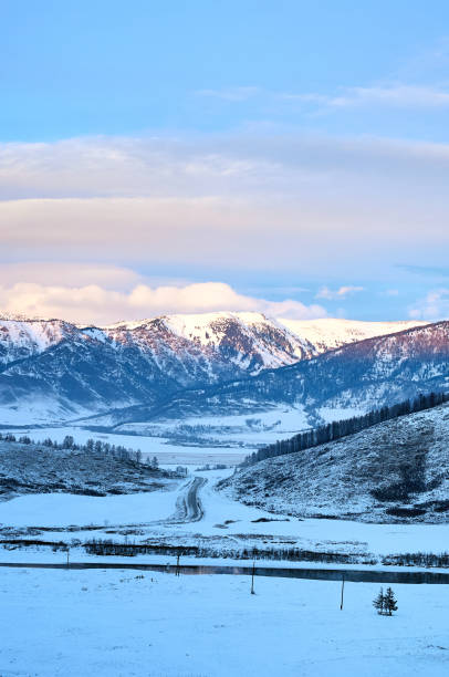 istock Cold snowy mountain landscape at sunset. 2153220333