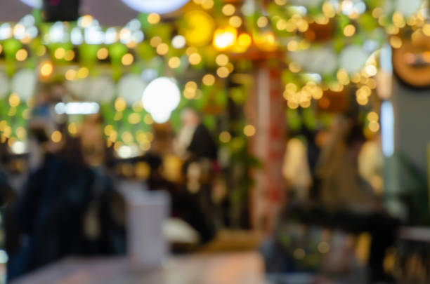 istock abstract blurred image of a street restaurant or cafe with light bokeh background 2153220476