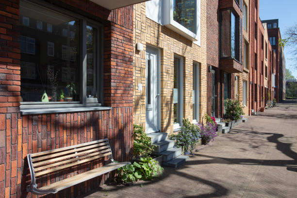 Street with apartments and a bench in the Netherlands