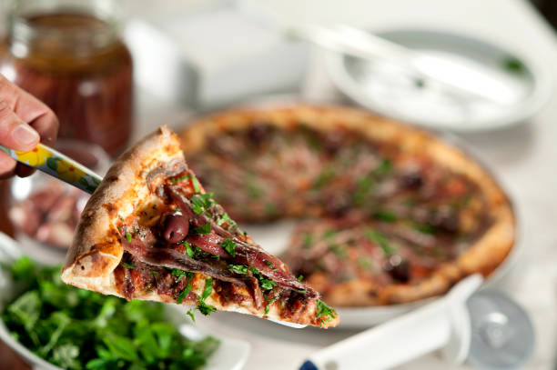 istock Slice of aliche pizza 2153223346