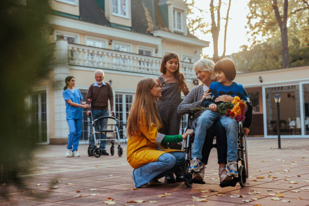 istock Visiting grandma in nursing home. 2153224240