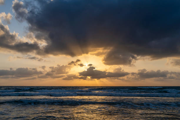 istock Mediterranean Sea with God's rays at sunset 2153227203