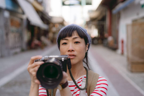 istock Female photographer 2153231725
