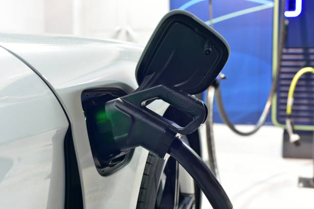 istock Charging an electric car with the power cable supply plugged in 2153232028