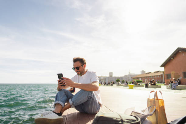 Man sitting on the pier