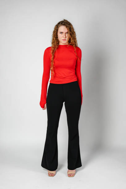 istock Young Woman With Curly Hair Expressing Concern 2153233966