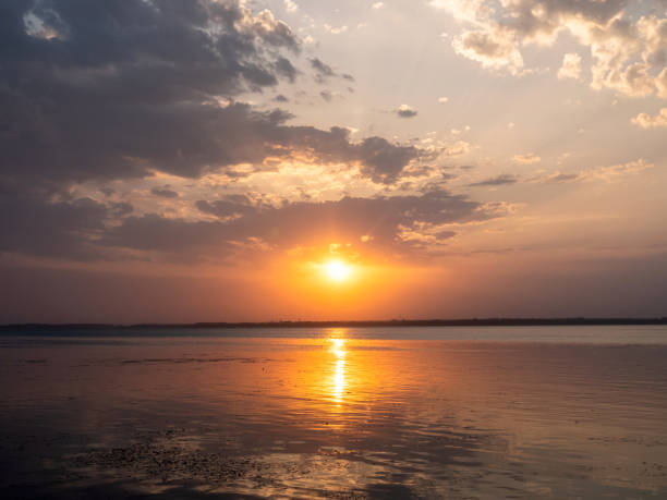 istock The sunset by the lake in the evening 2153234382
