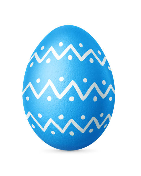 Blue ornate Easter egg isolated on a white background. Homemade painted Christian decoration.