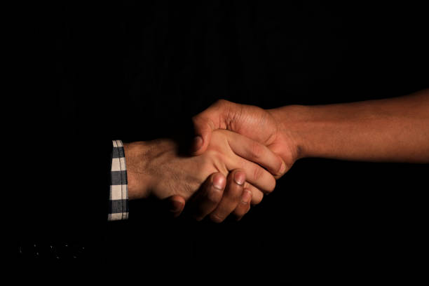 Business agreement handshake