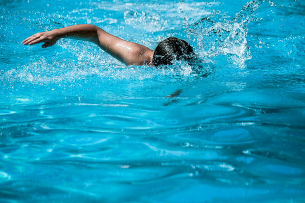 istock Teenager swimming breaststrok 2153243775