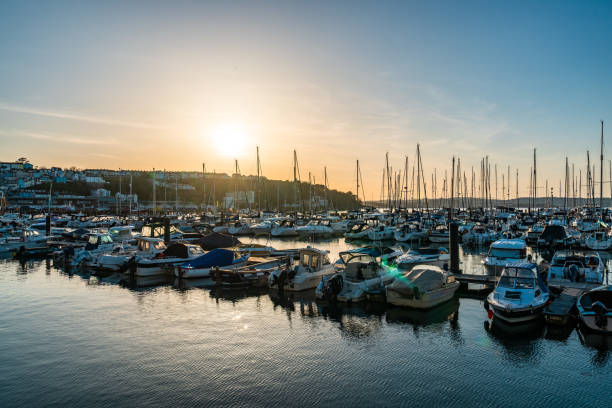 istock Brixham harbour England with sailing barges 2153244328