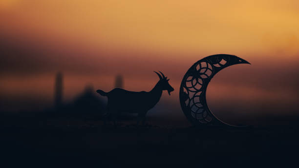 istock Eid Mubarak creative photography, Goat with crescent moon on sunset beach, Eid Al Adha greeting background with copy space for greeting text 2153248604