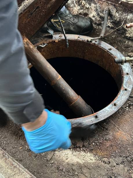 istock Washing and making safe an old underground diesel tank 2153250931