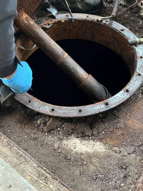 istock Washing and making safe an old underground diesel tank 2153250942