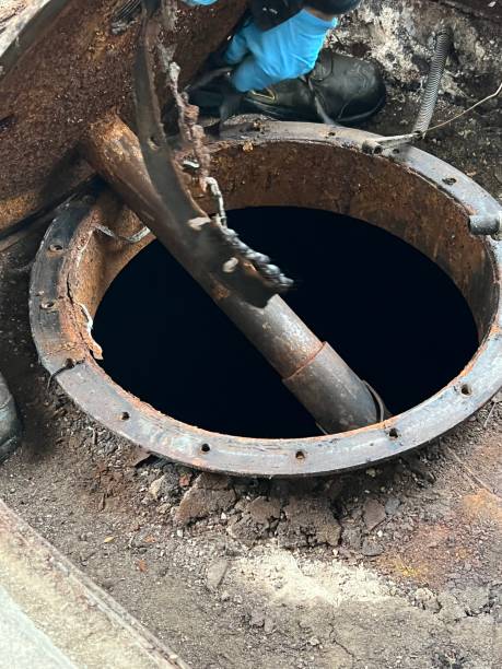 istock Washing and making safe an old underground diesel tank 2153250971
