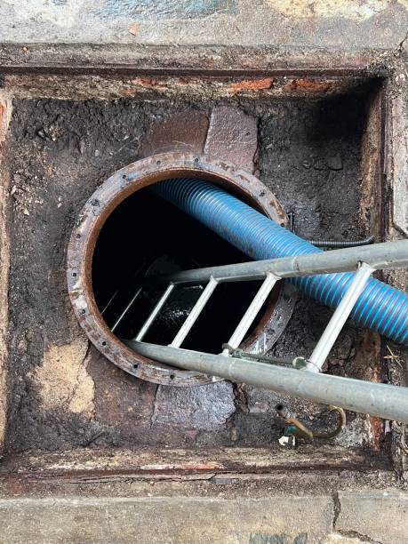 istock Washing and making safe an old underground diesel tank 2153250972