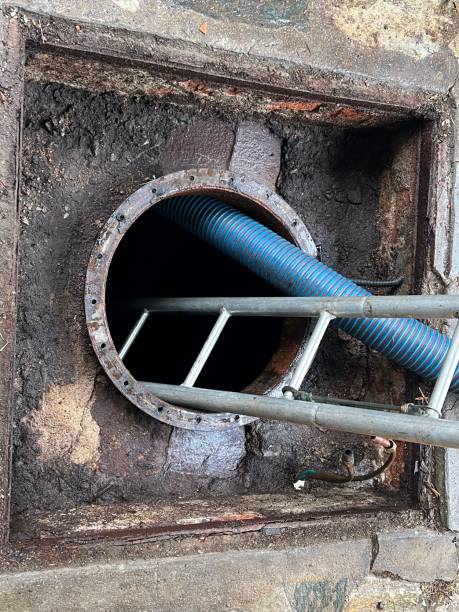 istock Washing and making safe an old underground diesel tank 2153250978