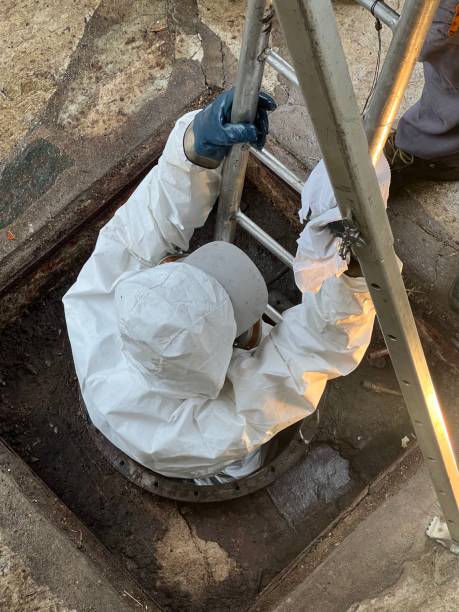 istock Washing and making safe an old underground diesel tank 2153250997