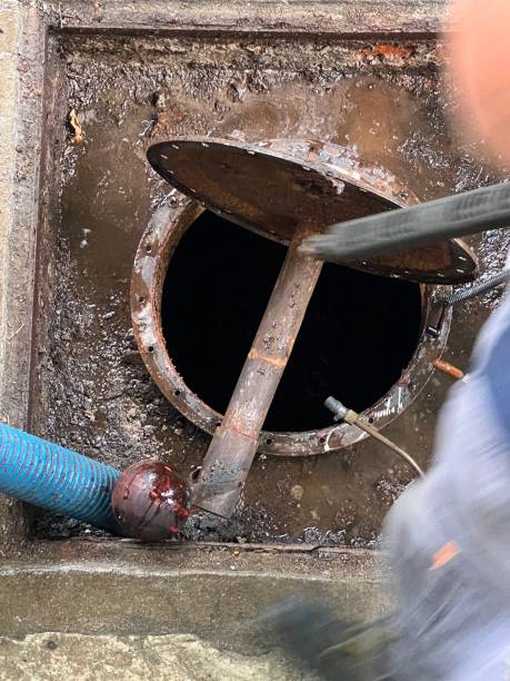 istock Washing and making safe an old underground diesel tank 2153251000